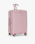 Blush Ultimax II 25-inch checked suitcase at a three-quarter angle.