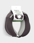 The Travel Pillow with its Traveler's Choice tag reading Memory Foam Travel Pillow & Eye Mask