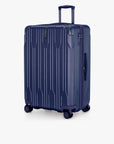 Angled front view of a navy Bell Weather large checked suitcase with its telescoping handle extended.