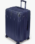 Angled view of a navy Bell Weather large checked suitcase with its expansion section open.
