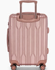 Rear view of a rose gold Bell Weather carry-on with its telescoping handle extended.
