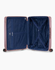 Open rose gold Bell Weather large checked suitcase with navy lining, a zippered divider and tie-down straps.