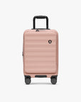 Pink Novia carry-on viewed from the front with its telescoping handle extended.