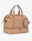 Beige quilted Weekender Bag in an angled studio view with matching Mini Tote attached