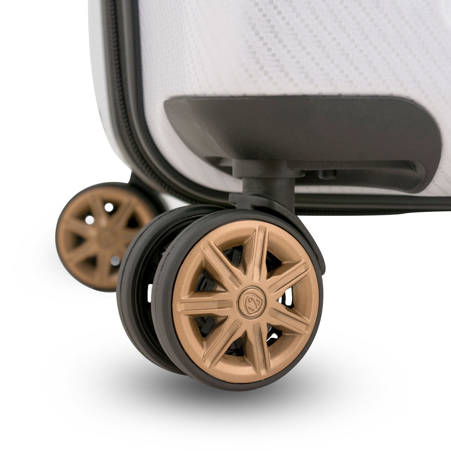 An image of a golden wheel on the white trunk luggage.
