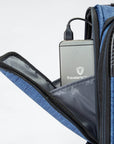 Image of a luggage that has a portable charger in the front pocket.