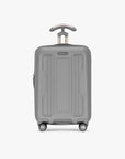 Gray hardshell carry-on shown from the front with its telescoping handle extended