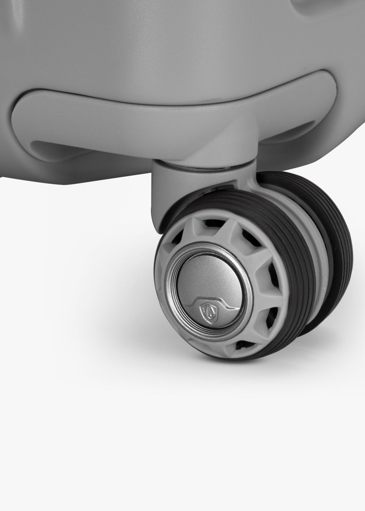 Close-up of a spinner wheel on the Gray Ultimax II 25-inch checked suitcase.
