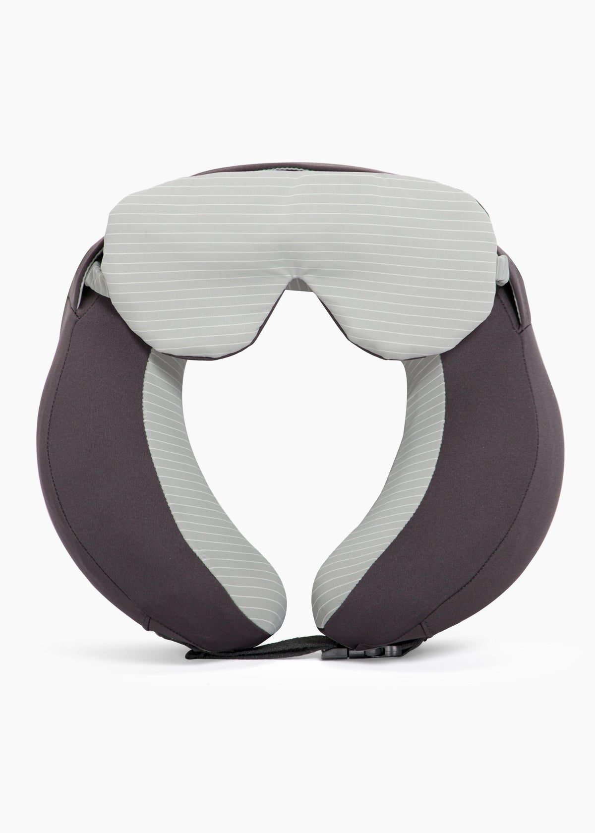 The Travel Pillow with its light gray eye mask resting across the top