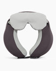 The Travel Pillow with its light gray eye mask resting across the top