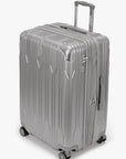 Angled view of a silver Bell Weather large checked suitcase with its expansion section open.