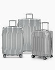 Silver Bell Weather three-piece luggage set with carry-on, medium checked and large checked suitcases.