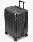 Angled view of a black Bell Weather medium checked suitcase with its expansion section open.
