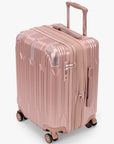 Angled view of a rose gold Bell Weather carry-on with its expansion section open.