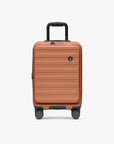 Orange Novia carry-on viewed from the front with its telescoping handle extended.