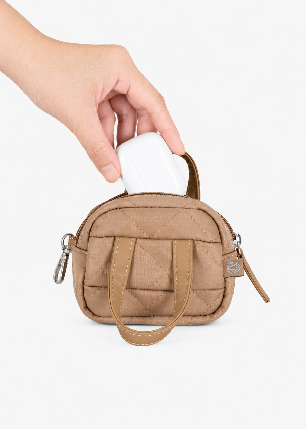 Beige quilted Mini Tote Bag showing its zippered opening
