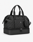 Black quilted Weekender Bag in an angled studio view with matching Mini Tote attached