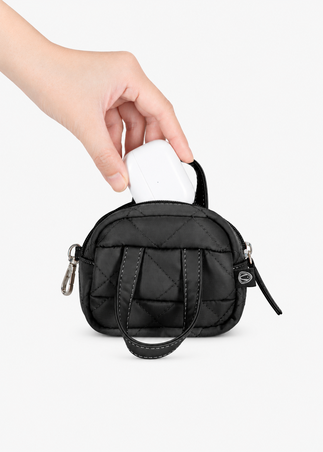 Black quilted Mini Tote Bag showing its zippered opening