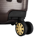 An image of a brown luggage with gold wheels.